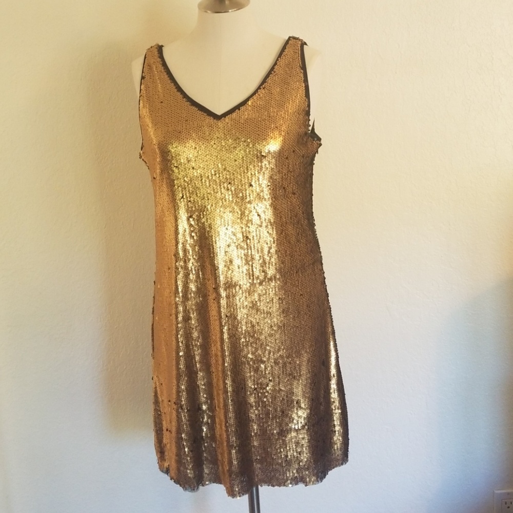 Gold and black sequin dress